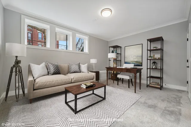 a view of a patio with couches and a table