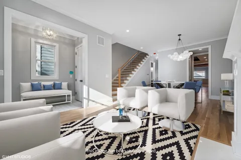 a kitchen with a table and chairs