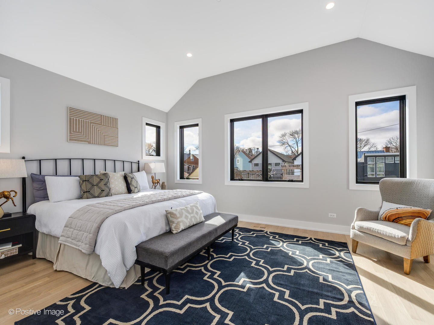 3302 North Hoyne Avenue Chicago, IL 60618 - Photo 10 of 27 a spacious bedroom with a bed and a couch