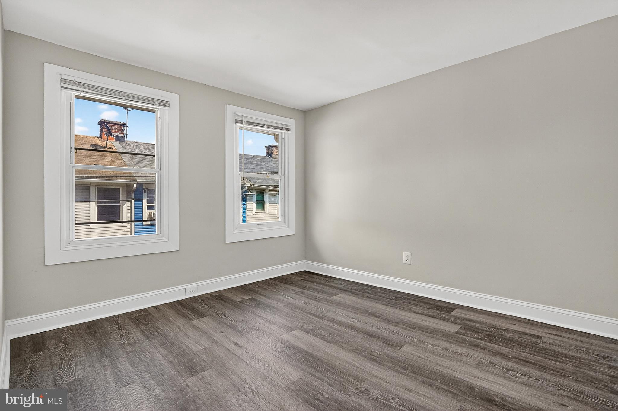 4203 Morrison Court Curtis Bay, MD 21226 - Photo 16 of 23 a view of empty room with wooden floor and fan