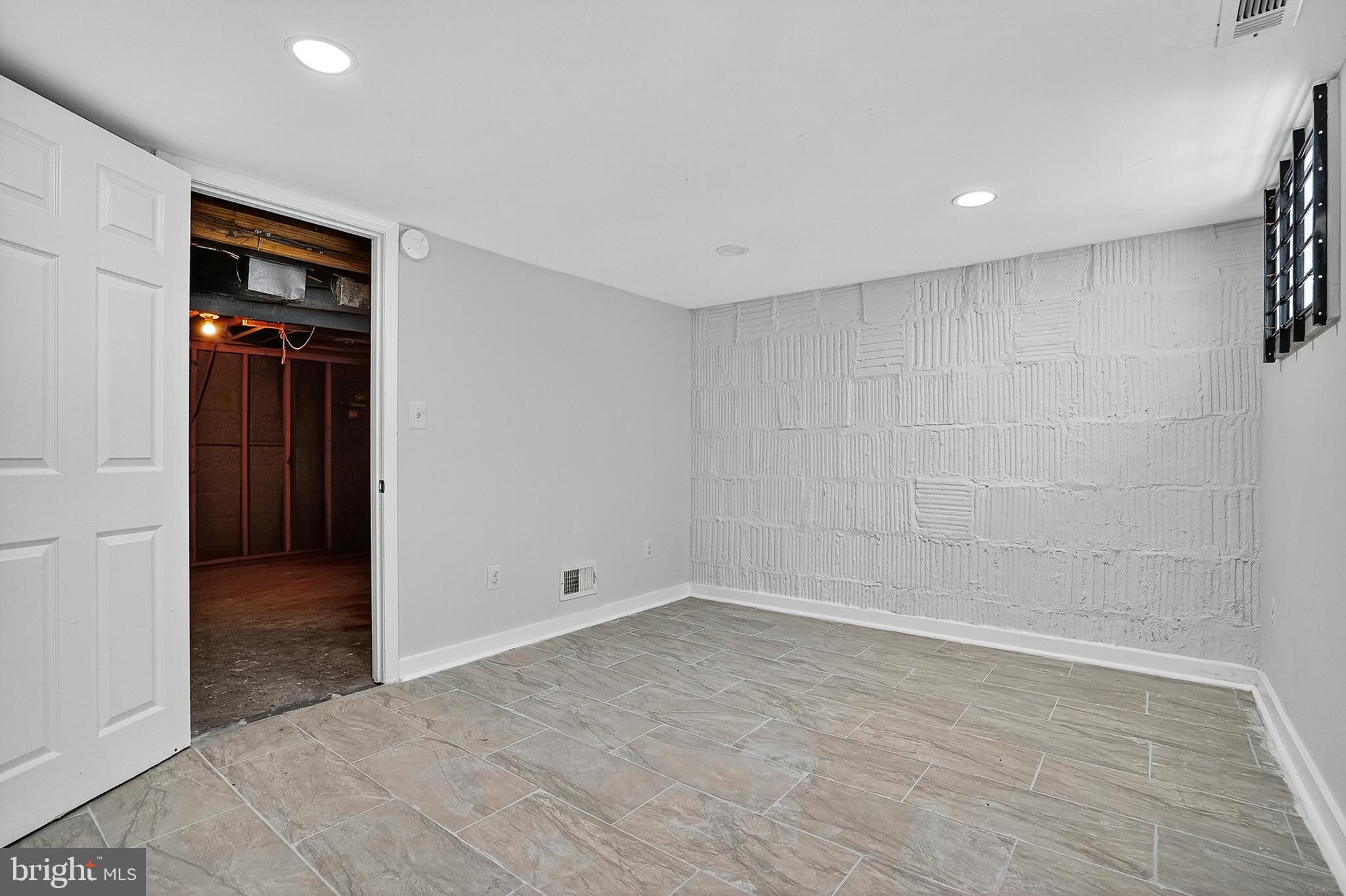 4203 Morrison Court Curtis Bay, MD 21226 - Photo 19 of 23 wooden floor in an empty room with a window
