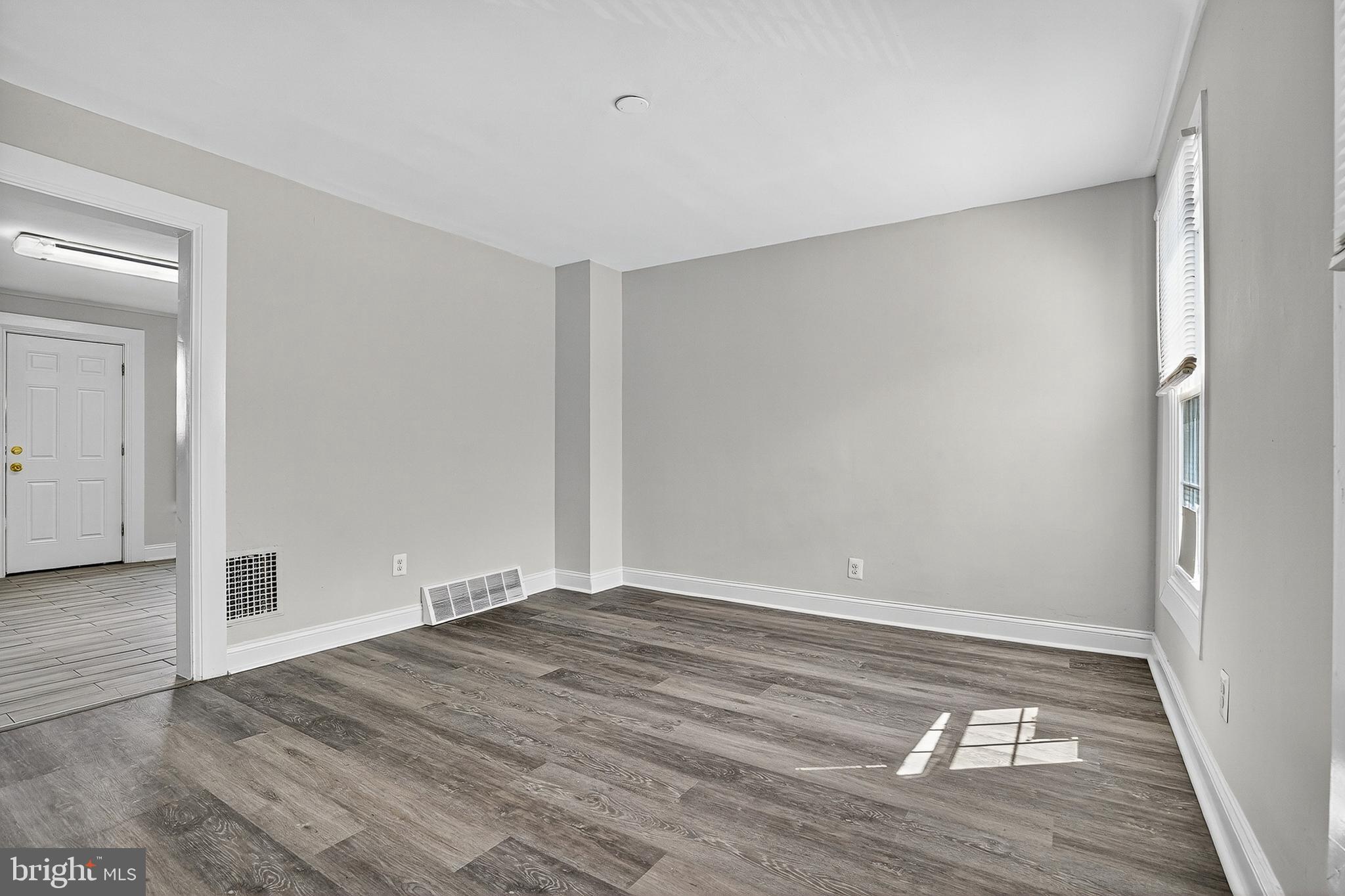 4203 Morrison Court Curtis Bay, MD 21226 - Photo 6 of 23 wooden floor in an empty room