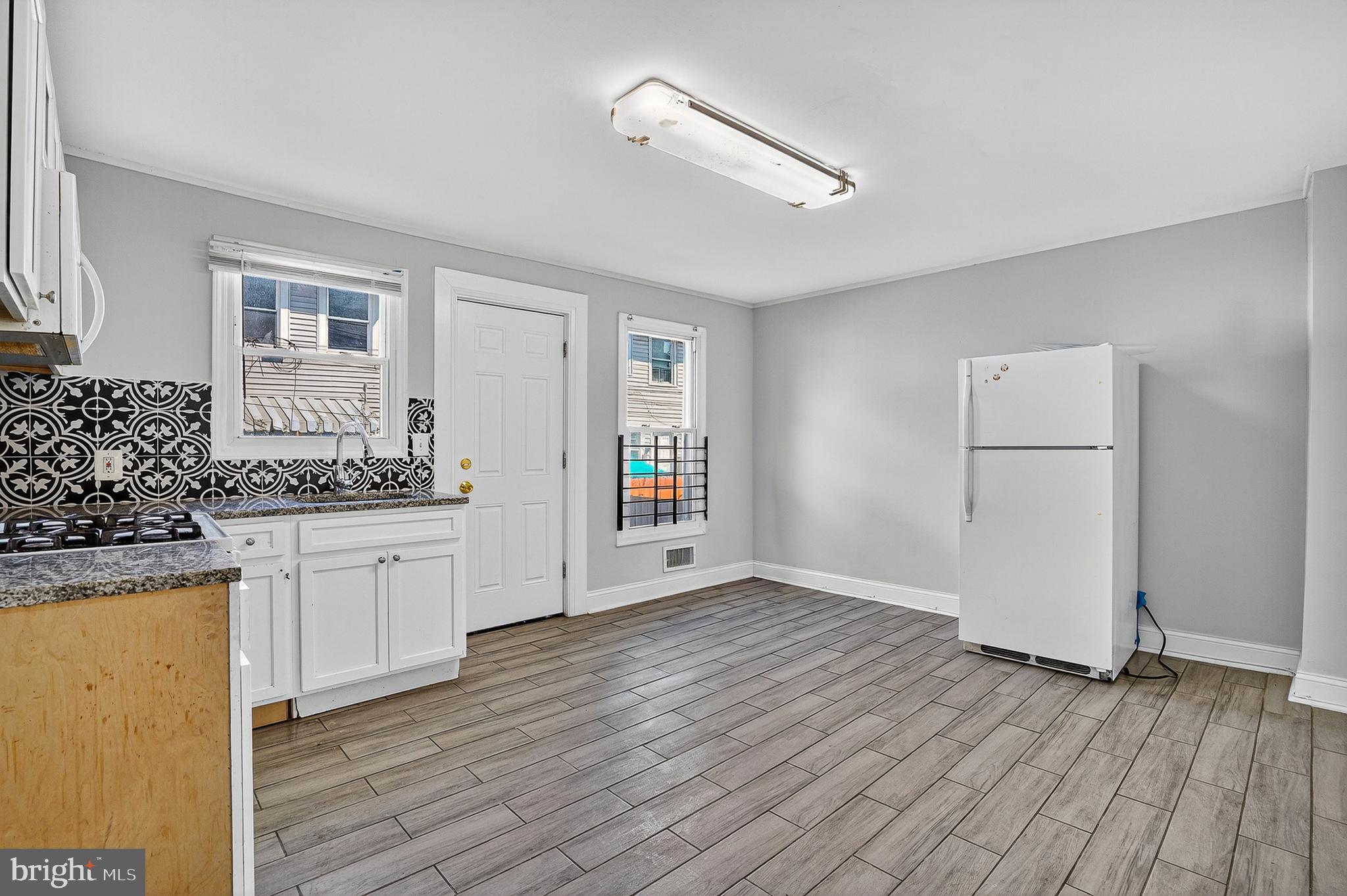 4203 Morrison Court Curtis Bay, MD 21226 - Photo 9 of 23 a bathroom with a sink and a mirror
