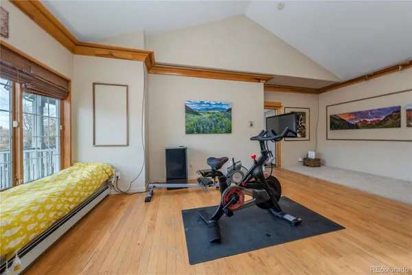 a view of a room with gym equipment