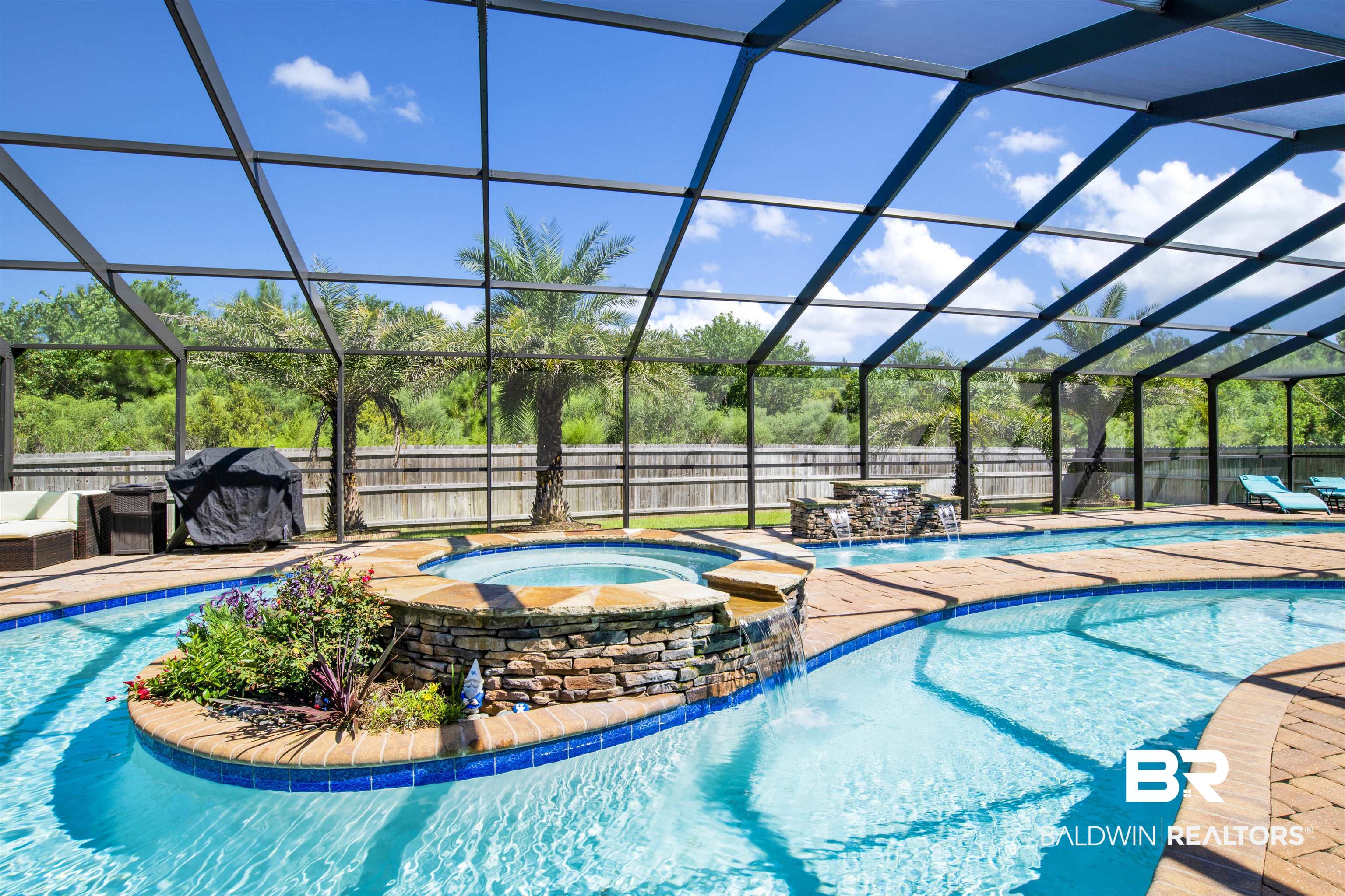 4196 Inverness Circle Gulf Shores, AL 36542 - Photo 32 of 43 View of swimming pool with pool water feature, an in ground hot tub, and glass enclosure