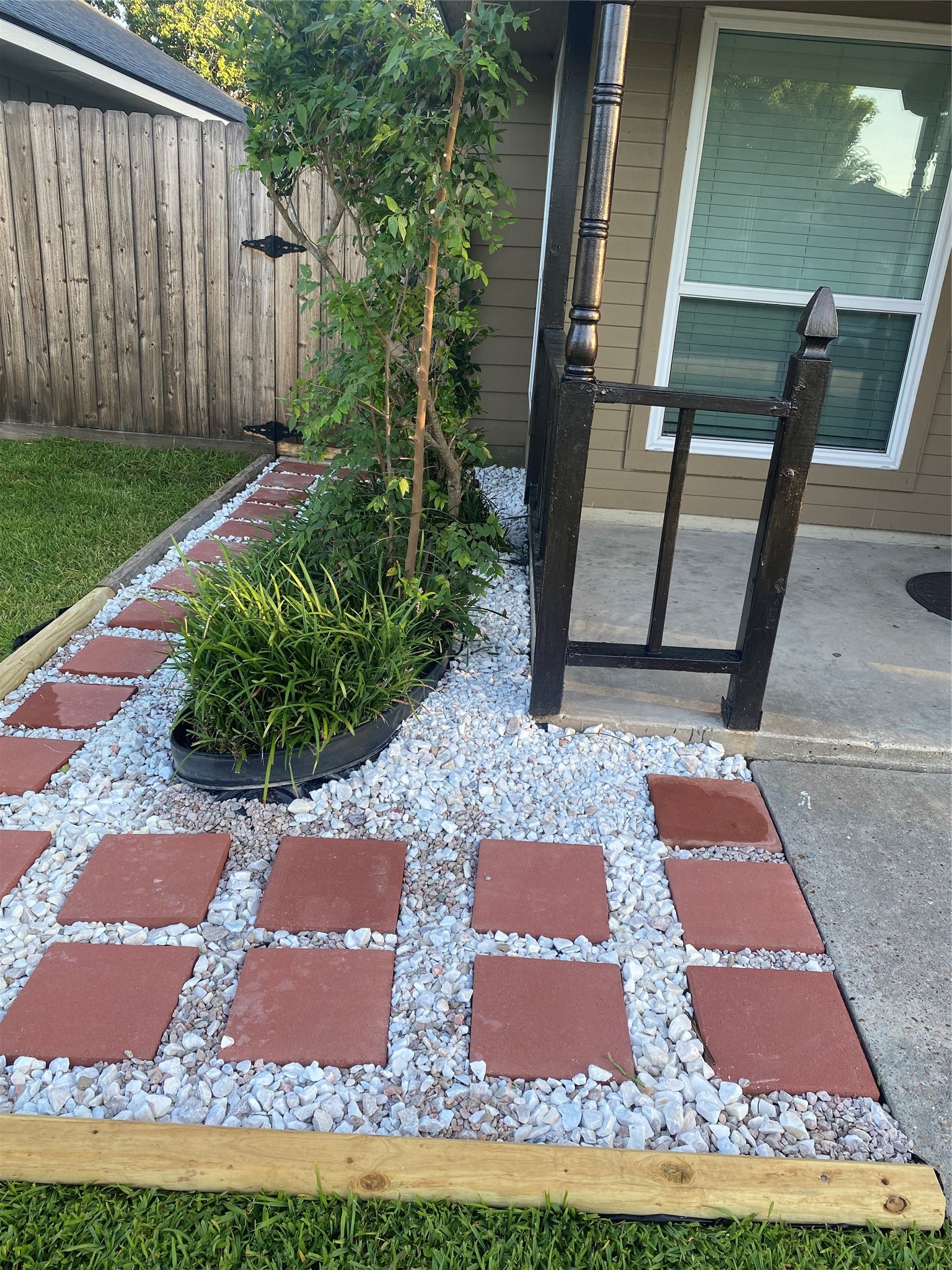 3107 Raccoon Run Spring, TX 77373 - Photo 11 of 35 Landscaping bricks in front of home that lead to the backyard
