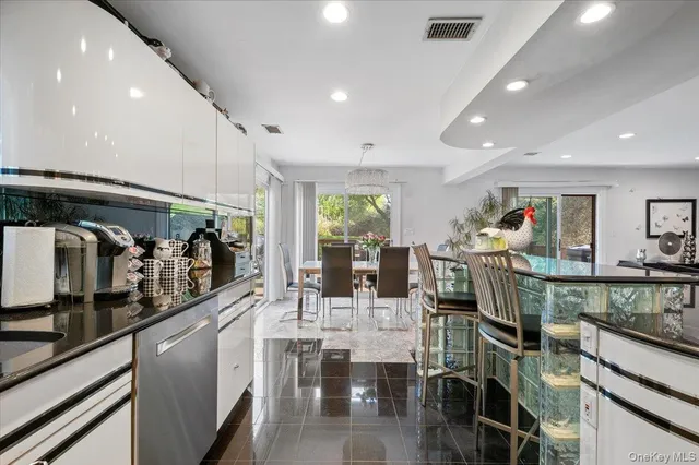 a view of a living room and dining room