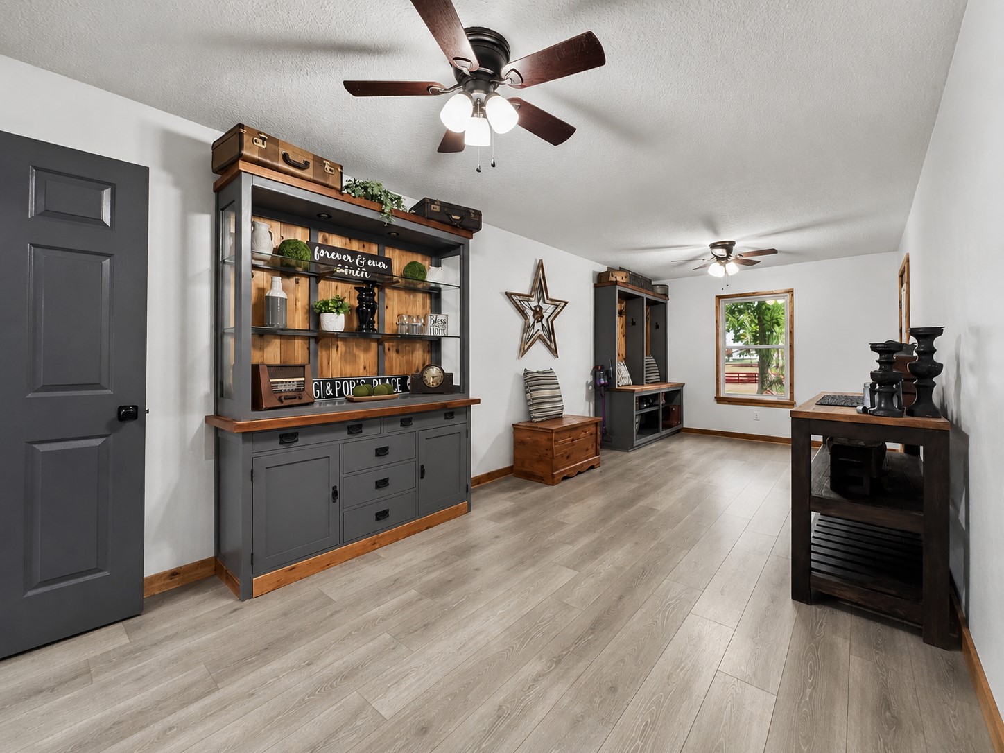 19023 Frey Road Hempstead, TX 77445 - Photo 10 of 49 The convenient mudroom provides a practical space to transition from the outdoors while adding to the home's inviting country charm.