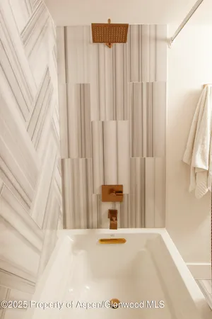 a view of a storage & utility room with a sink