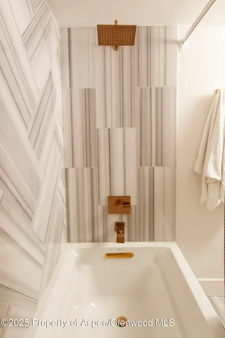 a view of a storage & utility room with a sink