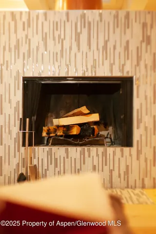 a bedroom with a bed and a view of bedroom