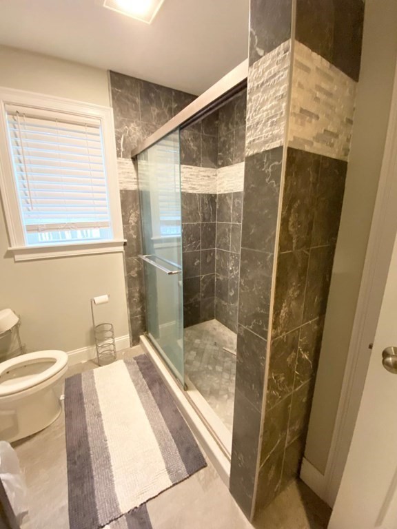 85 Littleton Road Ayer, MA 01432 - Photo 5 of 15 a bathroom with a sink and a shower