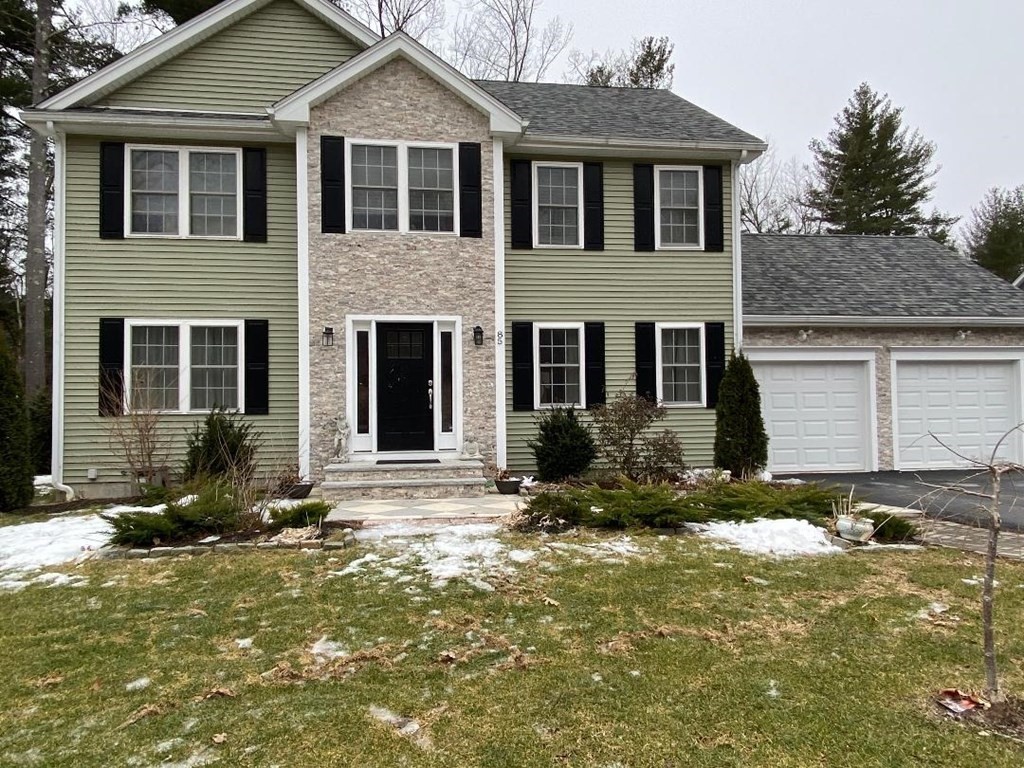 85 Littleton Road Ayer, MA 01432 - Photo 10 of 15 front view of a house with a yard