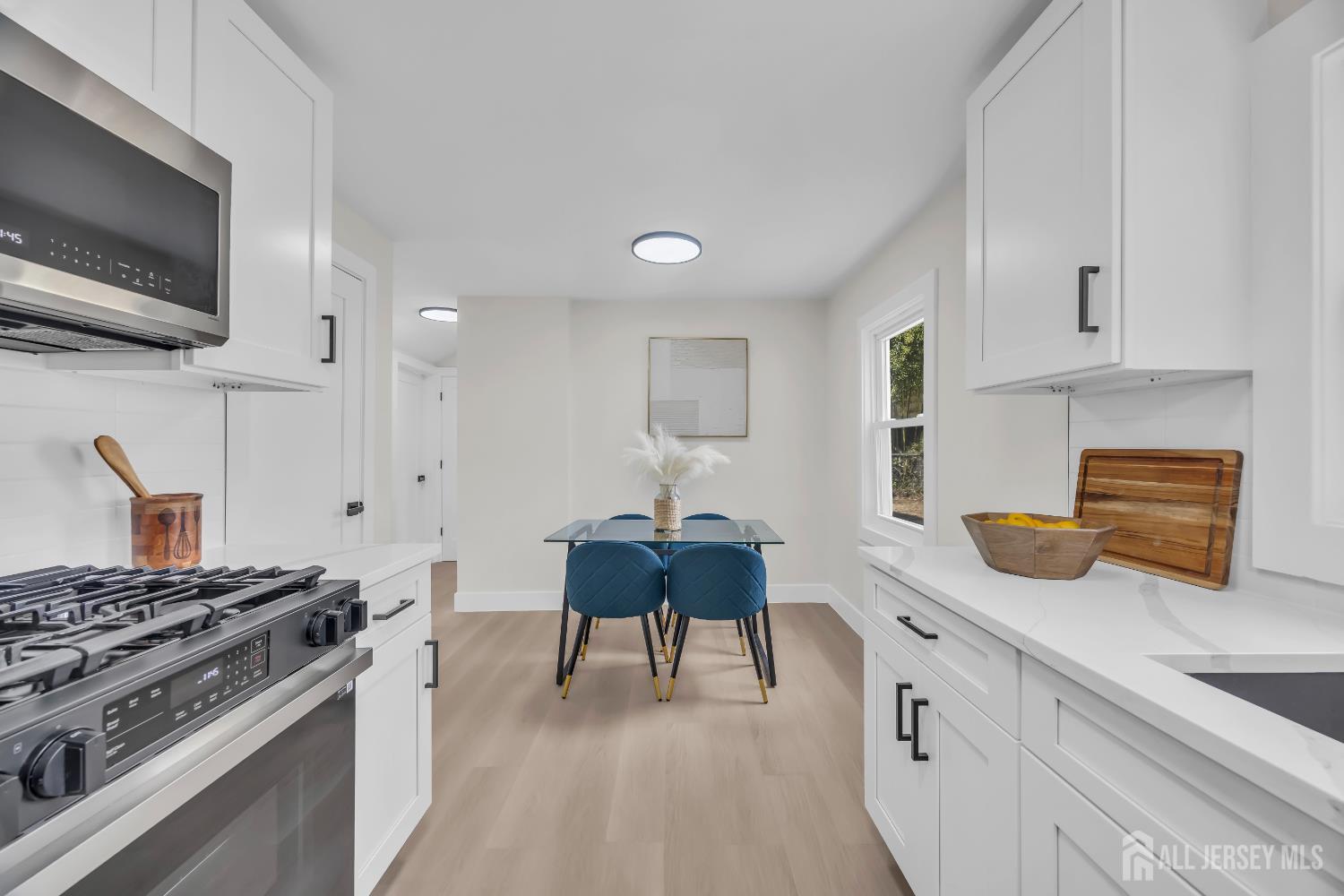 37 North Randolphville Road Piscataway, NJ 08854 - Photo 22 of 31 a kitchen with stainless steel appliances a stove a sink and a refrigerator