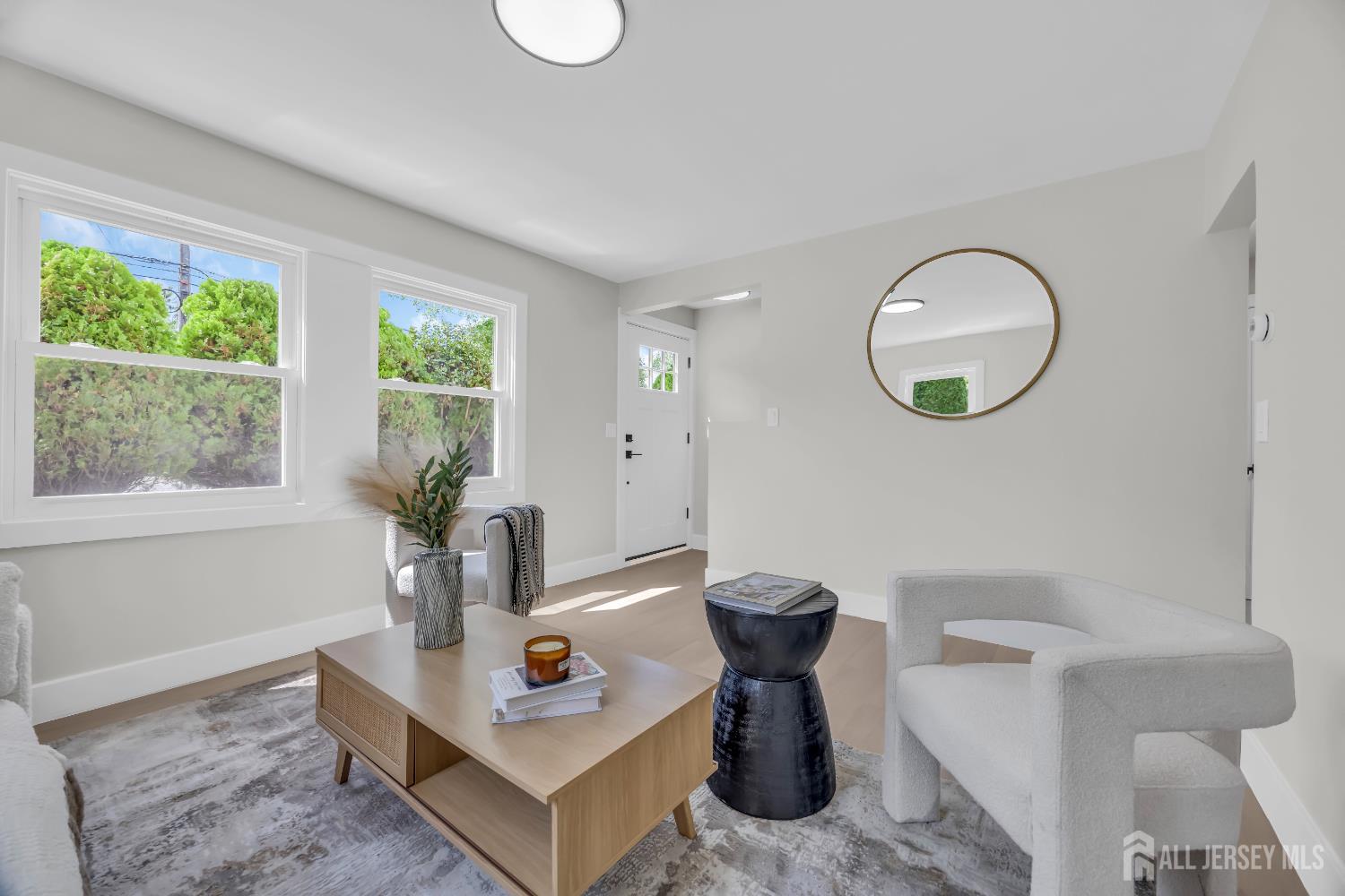 37 North Randolphville Road Piscataway, NJ 08854 - Photo 4 of 31 a living room with furniture a window and a potted plant
