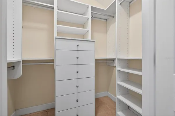 a view of an empty walk in closet