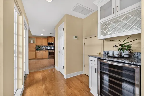 a view of kitchen and wooden floor