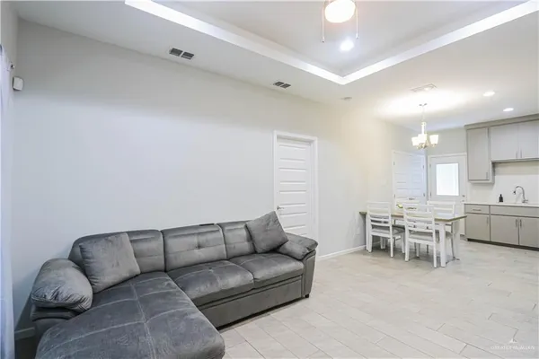 a living room with furniture and a couch