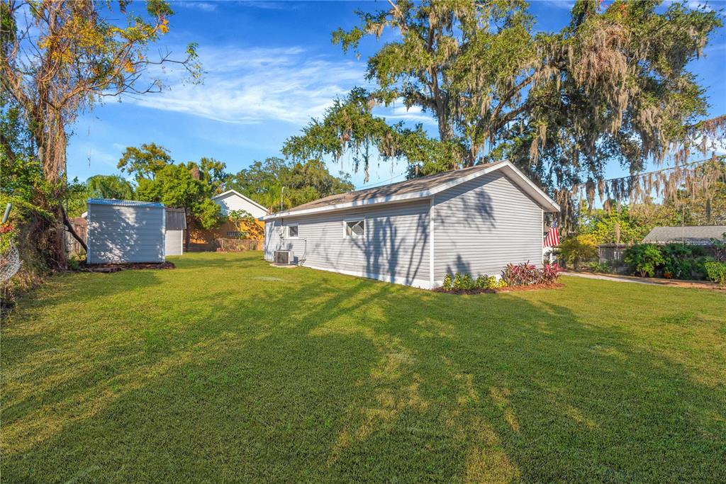 5226 Lime Avenue Seffner, FL 33584 - Photo 20 of 20 a view of a house with backyard and garden