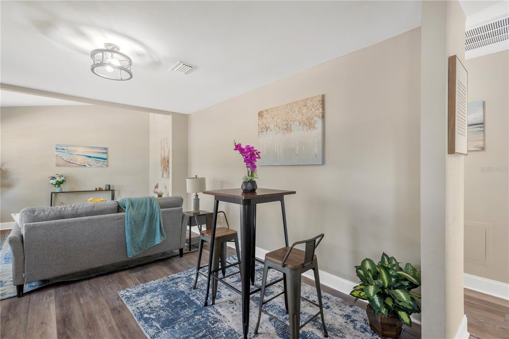 5226 Lime Avenue Seffner, FL 33584 - Photo 9 of 20 a living room with furniture and a potted plant