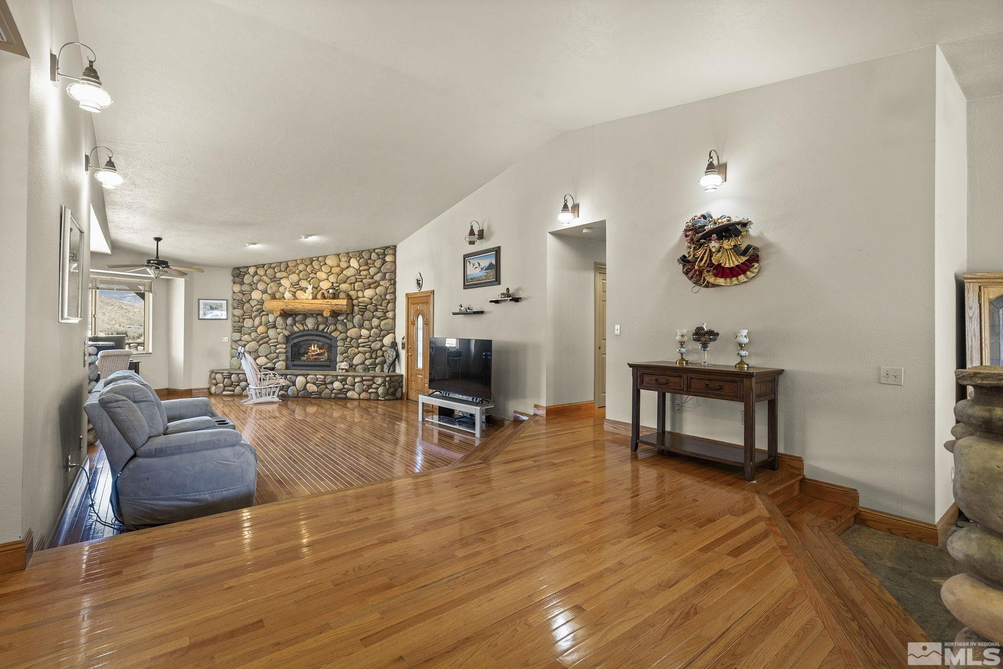 480 Duck Hill Road Washoe Valley, NV 89704 - Photo 12 of 46 a living room with furniture and a table