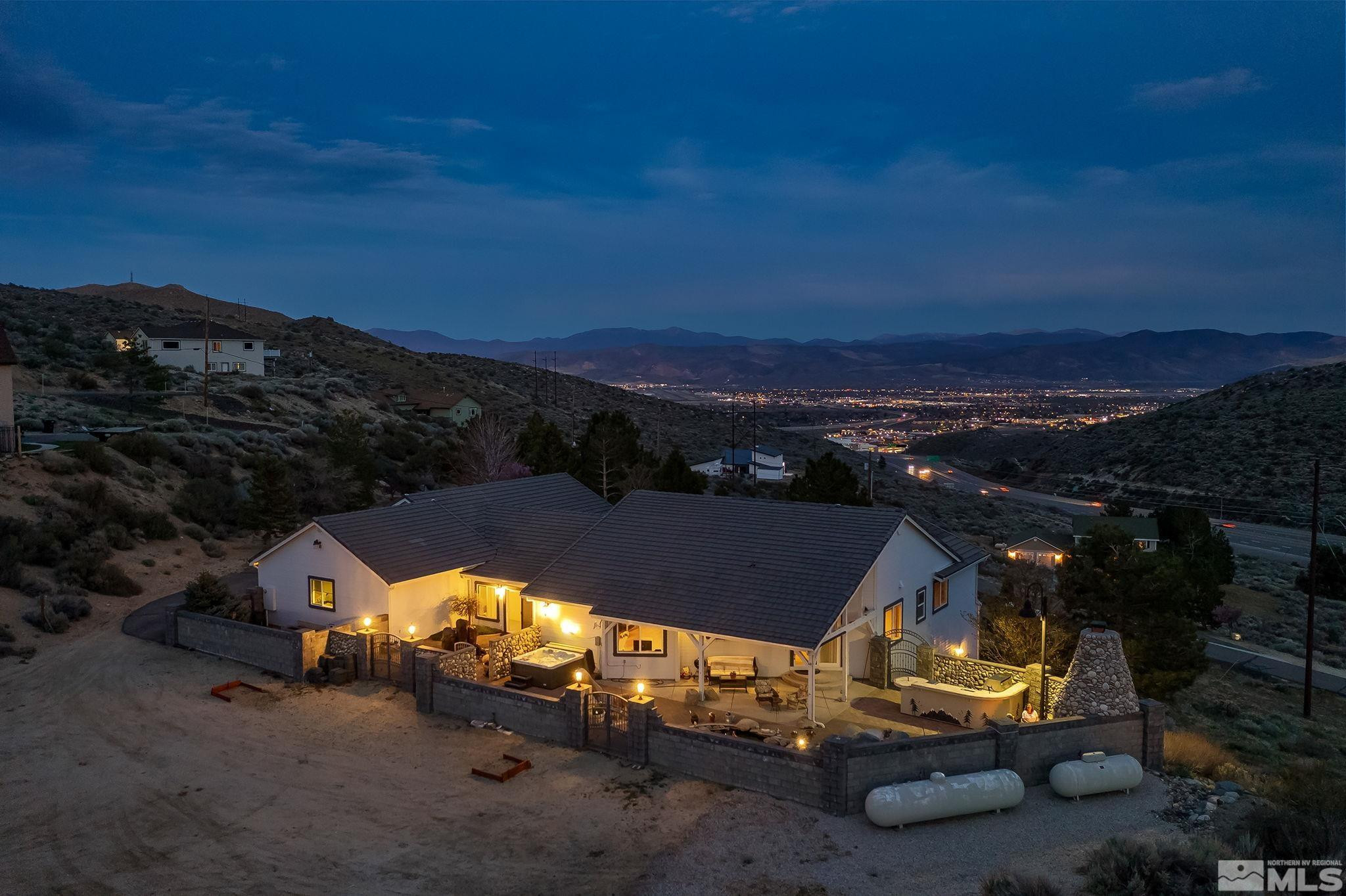 480 Duck Hill Road Washoe Valley, NV 89704 - Photo 27 of 46 an aerial view of a house with a yard