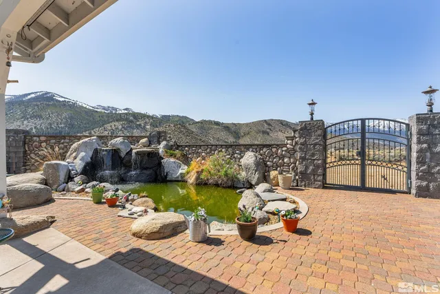 a view of a terrace with furniture