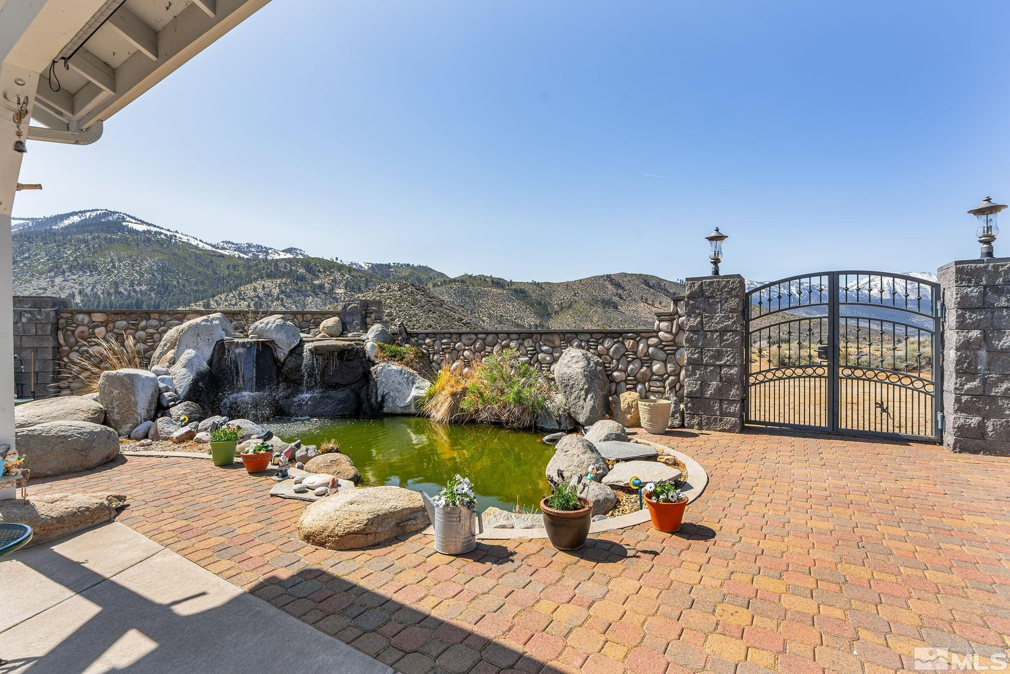 480 Duck Hill Road Washoe Valley, NV 89704 - Photo 31 of 46 a view of a terrace with furniture
