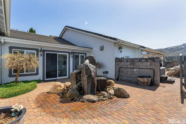 a view of a house with a patio