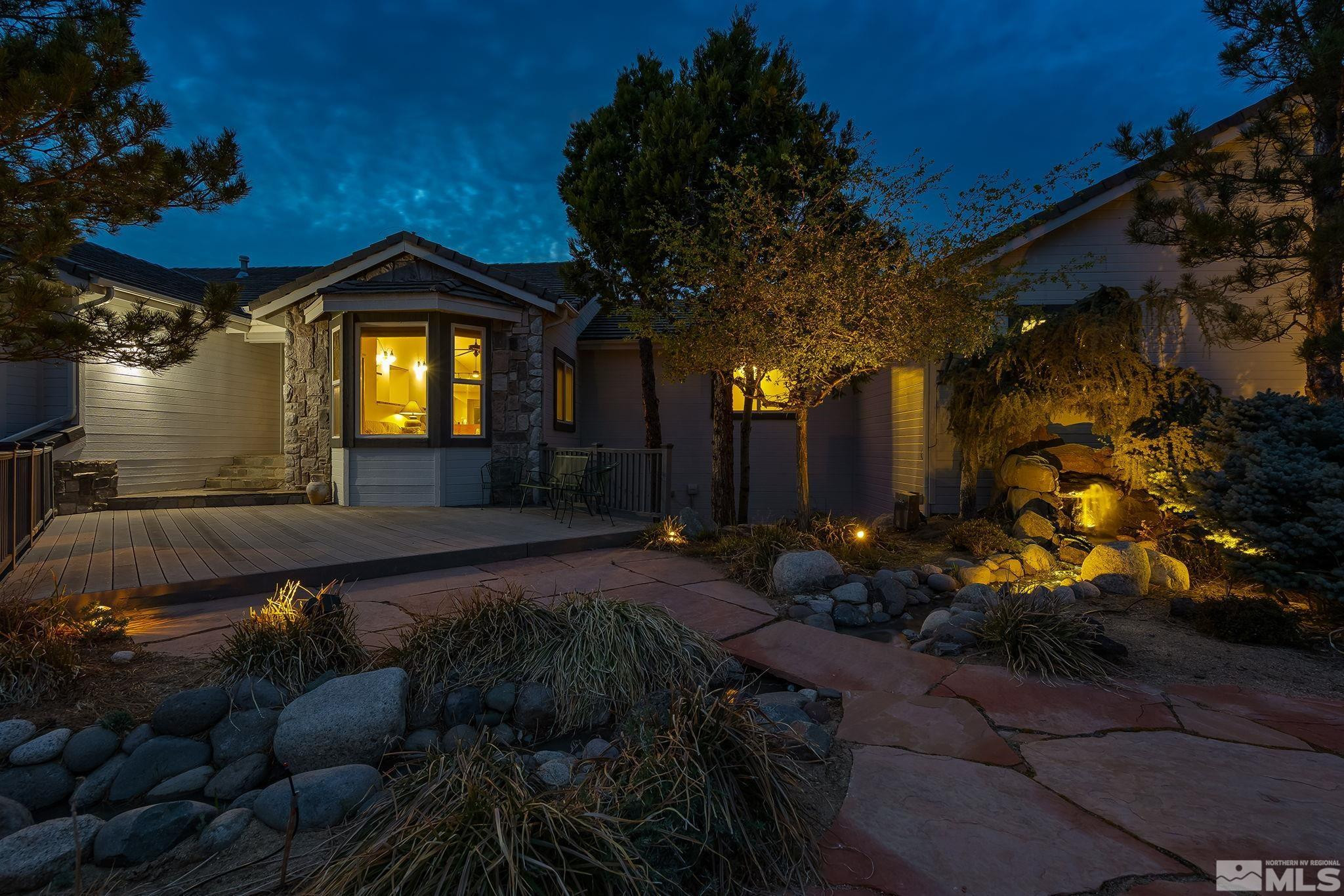 480 Duck Hill Road Washoe Valley, NV 89704 - Photo 10 of 46 a front view of a house with a yard