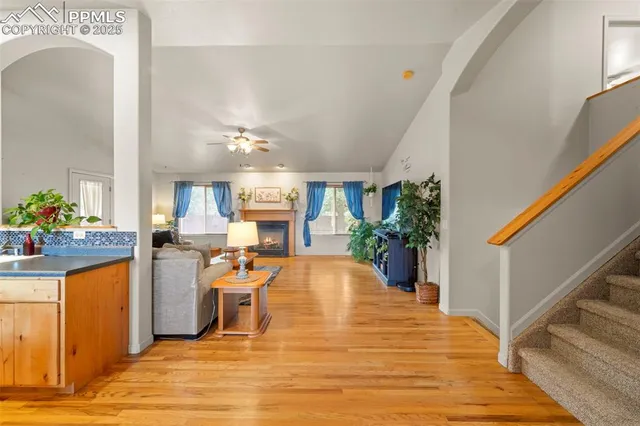 a view of a living room and kitchen
