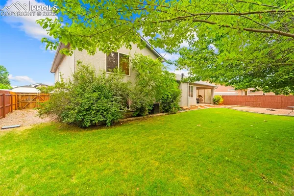a house view with a garden space