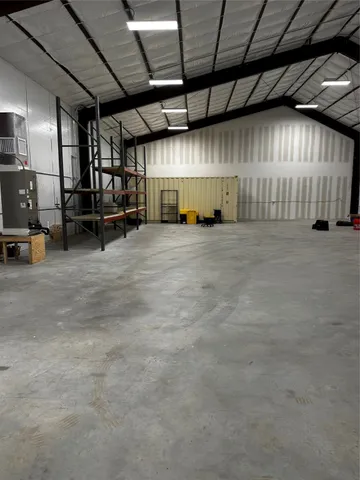 a bathroom with a toilet and a tub