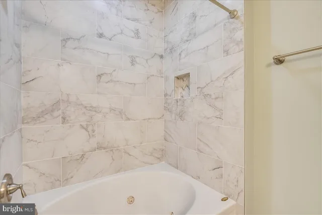 a front view of a house with glass windows