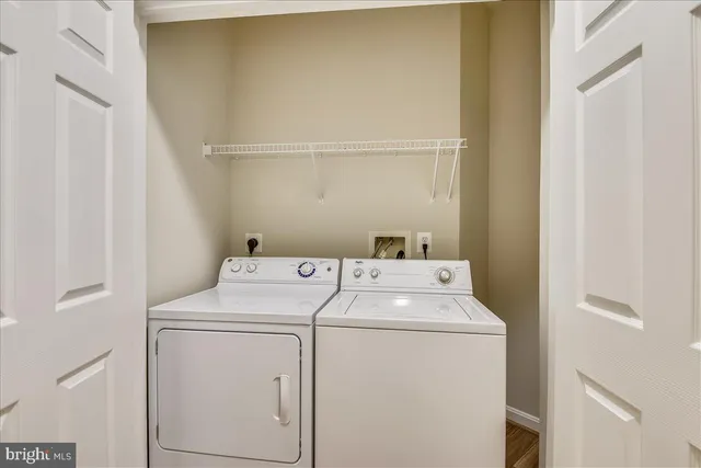 a front view of a house with outdoor seating