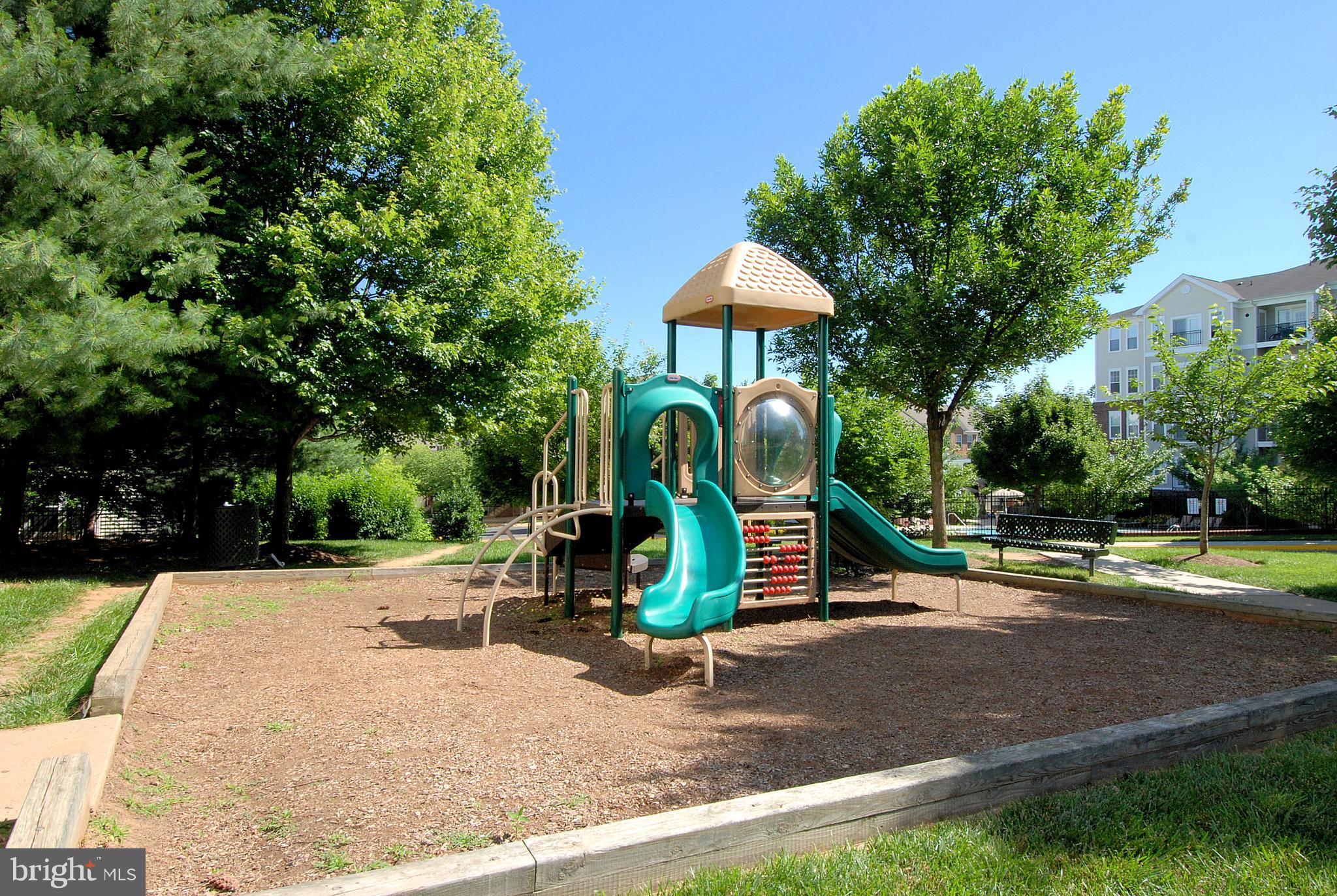 2931 Deer Hollow Way, Unit 102 Fairfax, VA 22031 - Photo 43 of 86 a view of a park with swings
