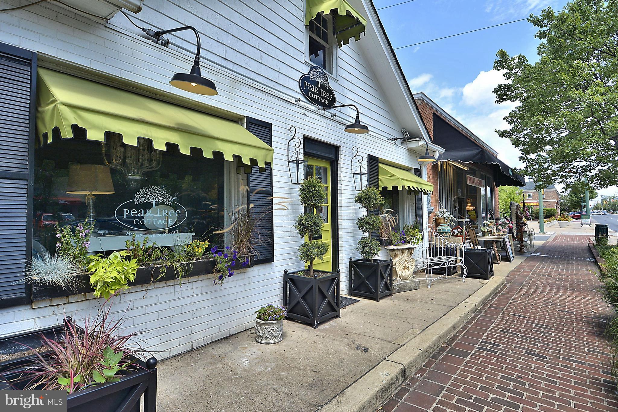 2931 Deer Hollow Way, Unit 102 Fairfax, VA 22031 - Photo 51 of 86 a view of a chairs and tables in patio