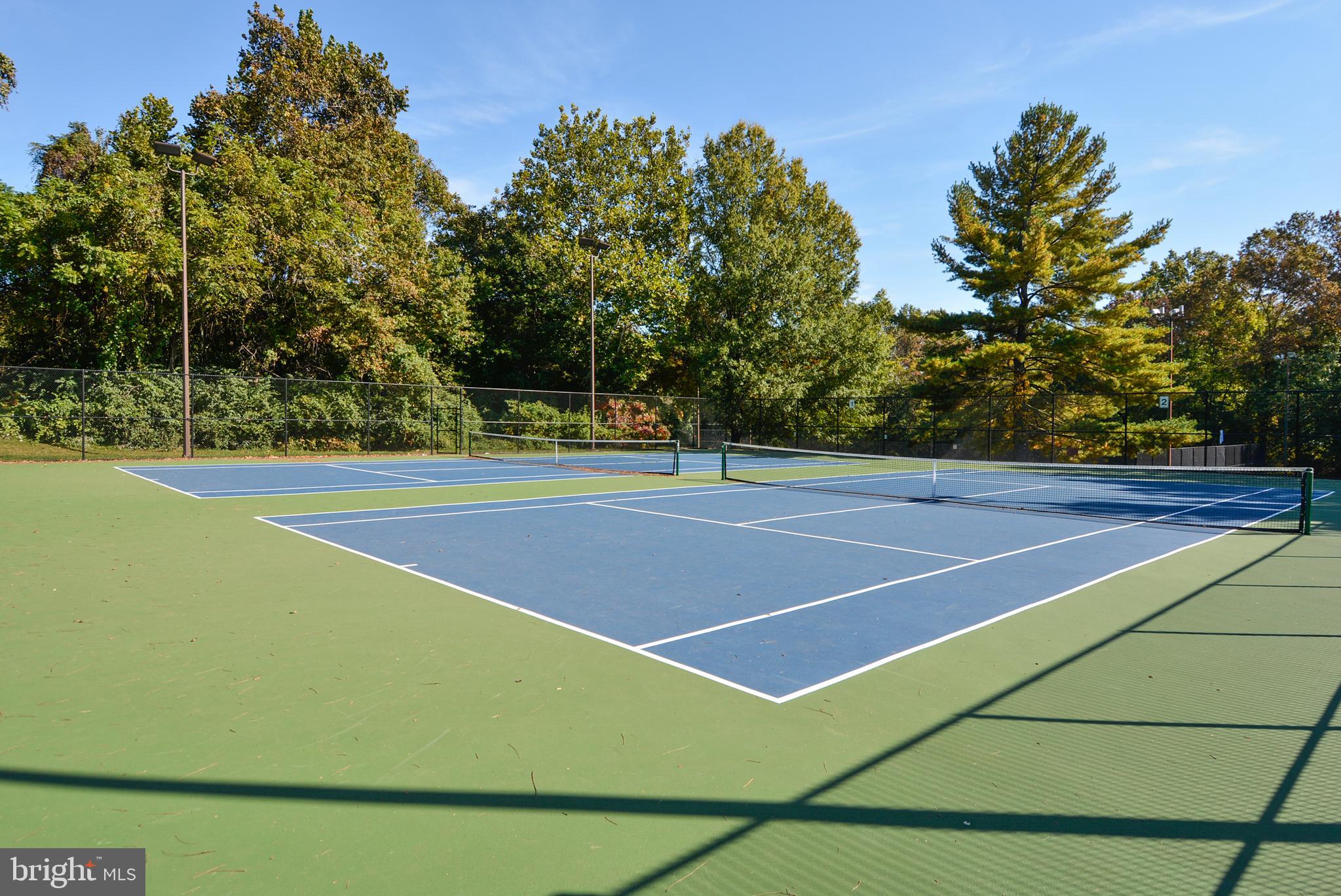 2931 Deer Hollow Way, Unit 102 Fairfax, VA 22031 - Photo 62 of 86 a view of a tennis court