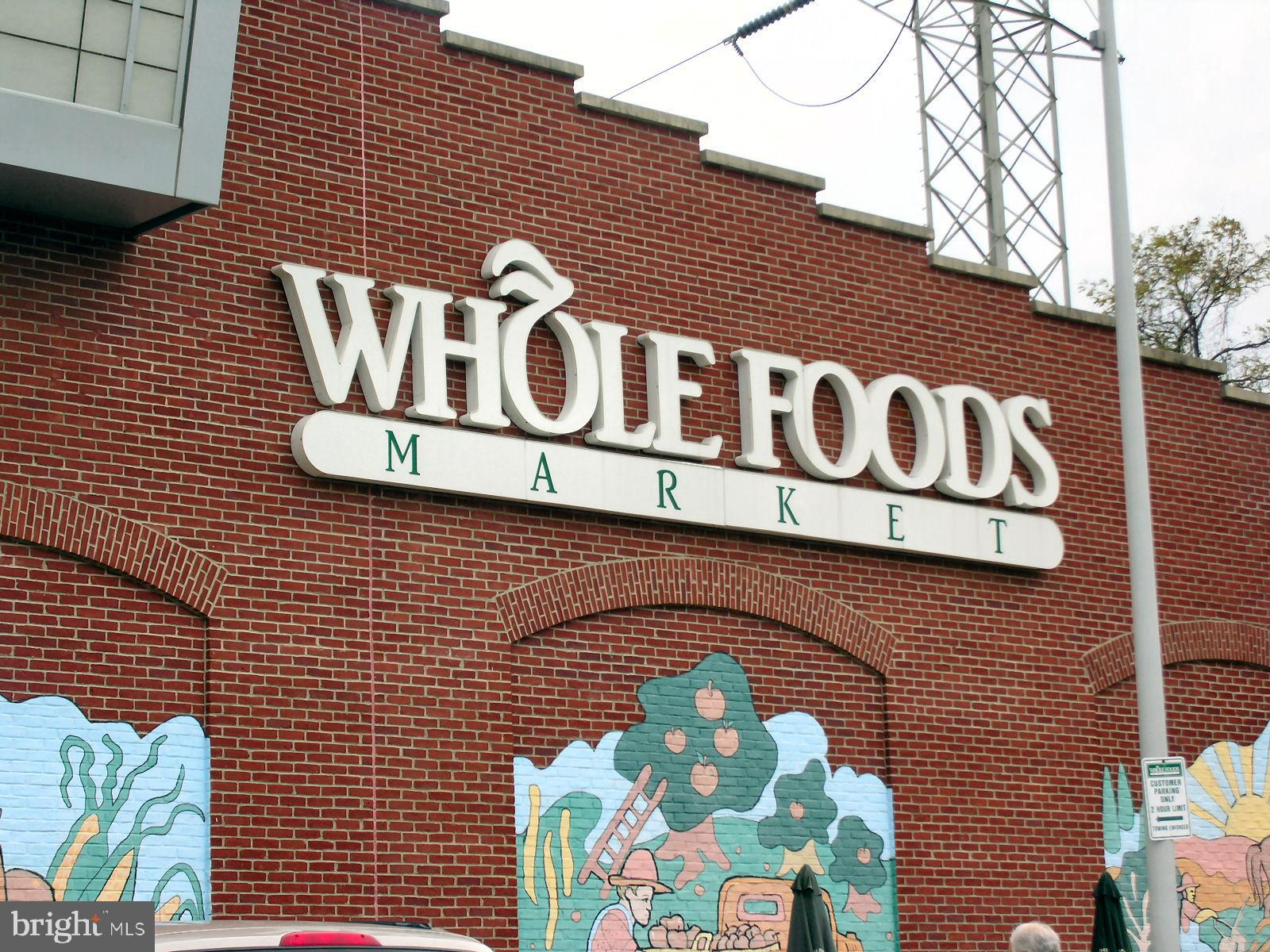 2931 Deer Hollow Way, Unit 102 Fairfax, VA 22031 - Photo 80 of 86 a street sign that is on a brick wall