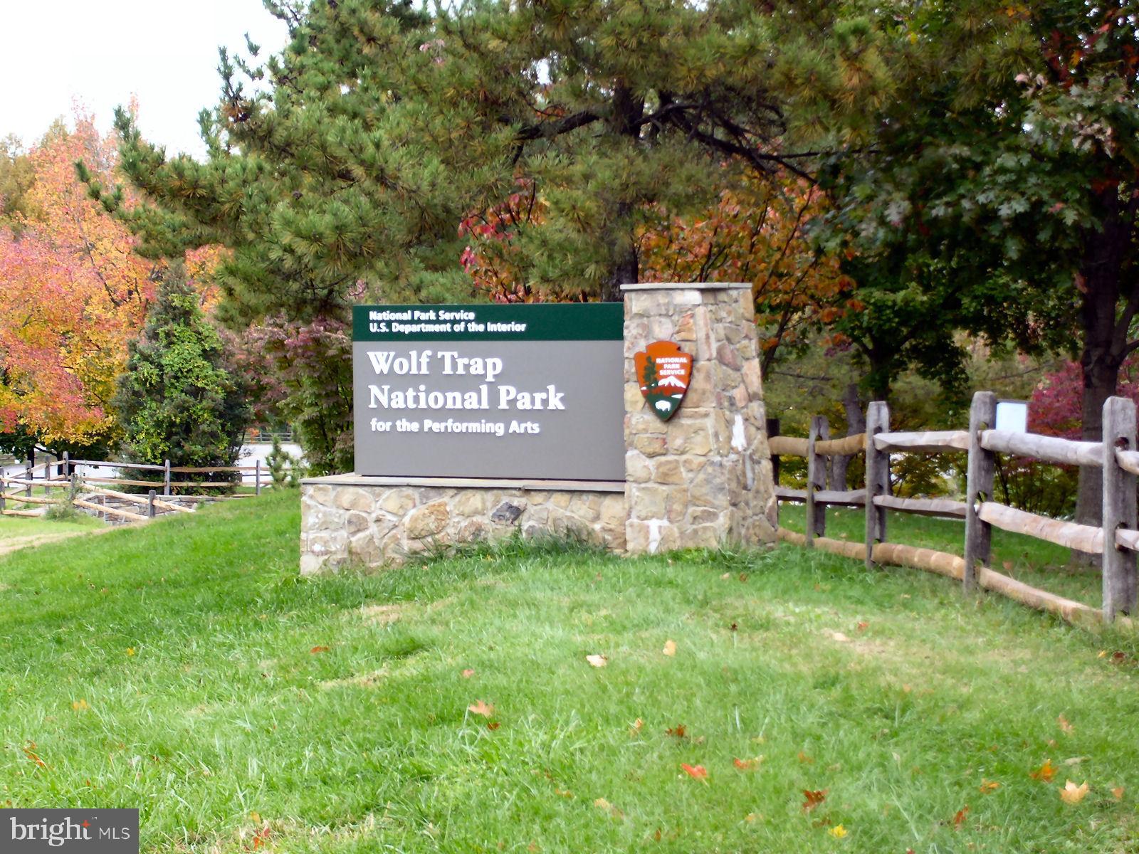 2931 Deer Hollow Way, Unit 102 Fairfax, VA 22031 - Photo 86 of 86 a view of outdoor space with sign board and garden