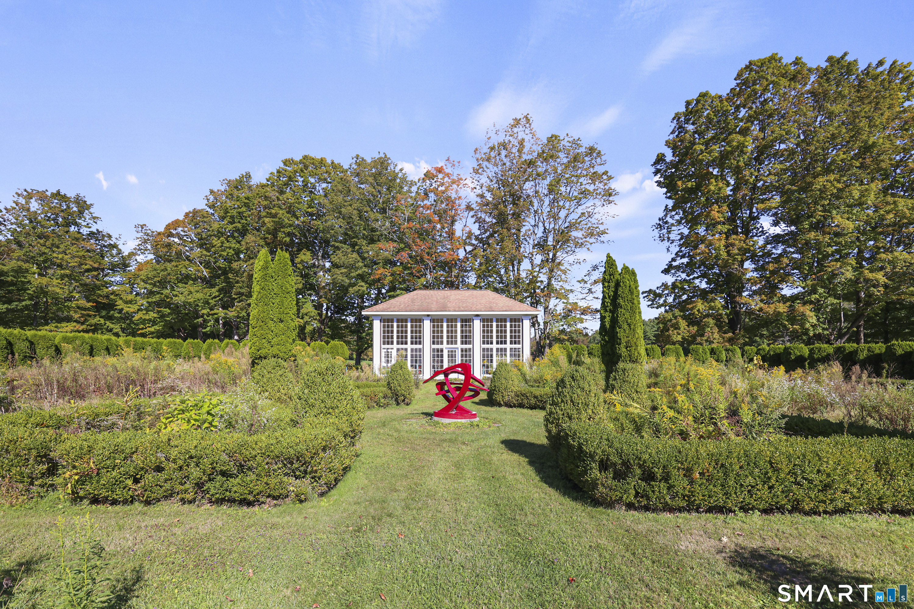 209 Blue Hill Road Great Barrington, MA 01230 - Photo 35 of 37 a front view of a house with a yard