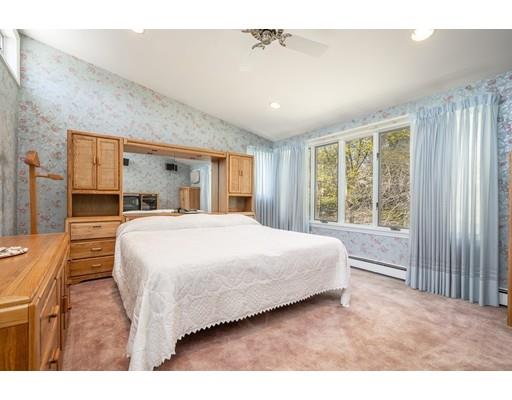 33 Lockeland Road Winchester, MA 01890 - Photo 16 of 28 a bedroom with a large bed and a large window