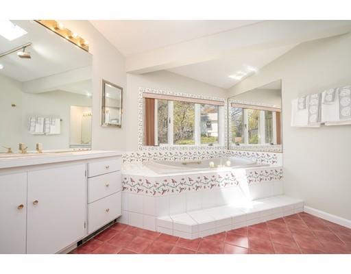 33 Lockeland Road Winchester, MA 01890 - Photo 19 of 28 a bathroom with a tub sink and mirror