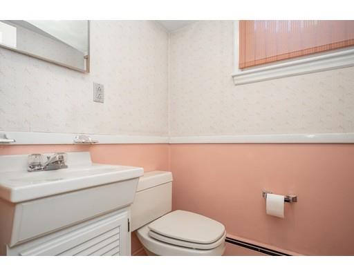 33 Lockeland Road Winchester, MA 01890 - Photo 21 of 28 a bathroom with a toilet a sink and mirror