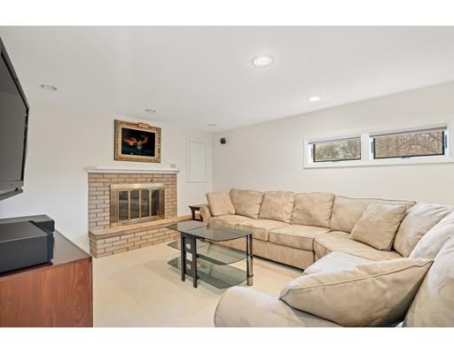 33 Lockeland Road Winchester, MA 01890 - Photo 22 of 28 a living room with furniture and a fireplace