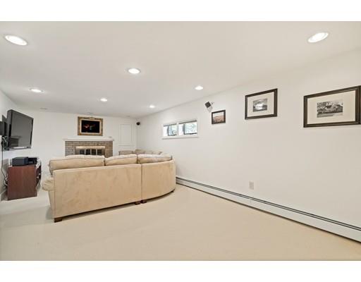 33 Lockeland Road Winchester, MA 01890 - Photo 23 of 28 a living room with furniture and a flat screen tv