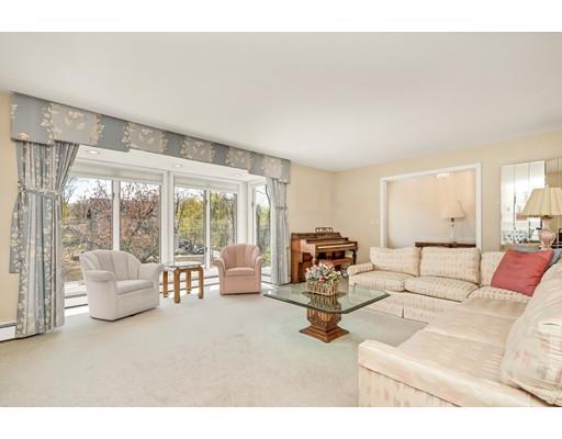 33 Lockeland Road Winchester, MA 01890 - Photo 3 of 28 a living room with furniture and large windows