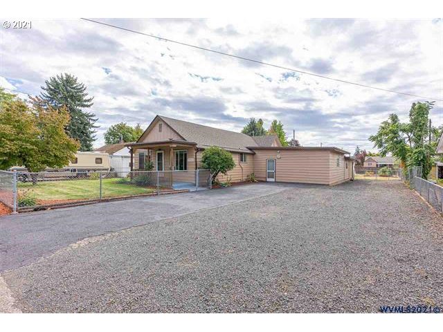 2455 G Street Springfield, OR 97477 - Photo 11 of 32 a view of house with backyard and entertaining space