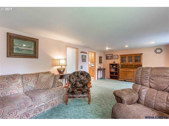 2455 G Street Springfield, OR 97477 - Photo 4 of 32 a living room with furniture and a couch