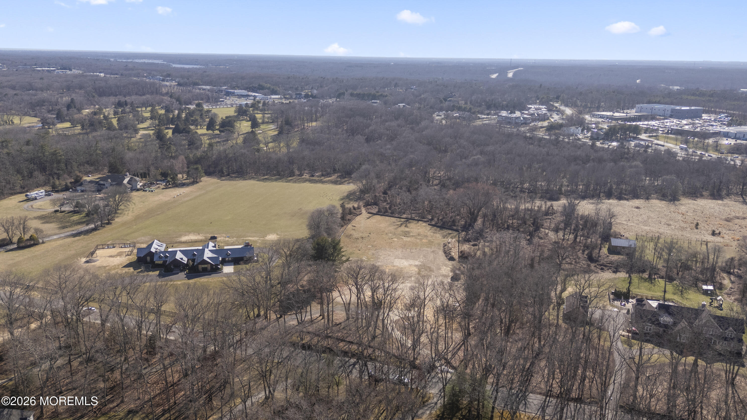 1831 Campbell Road Wall, NJ 07719 - Photo 7 of 20 an aerial view of residential houses with outdoor space and trees